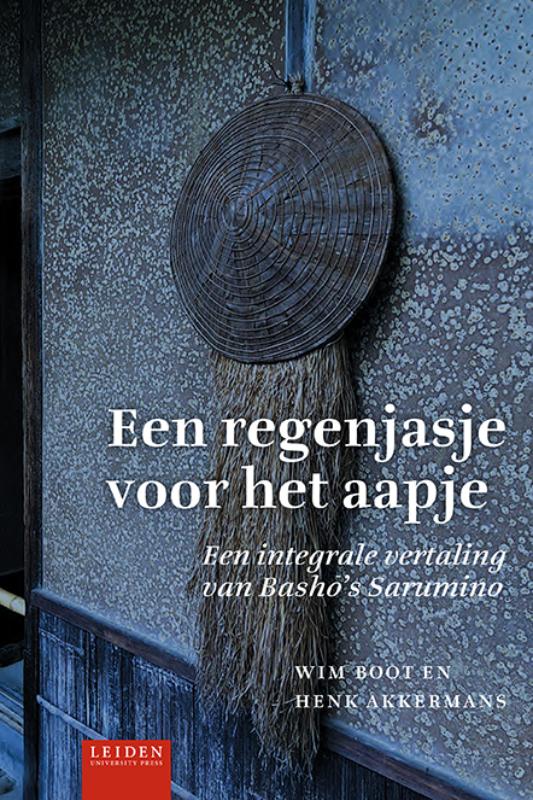 Omslag van Een regenjasje voor het aapje